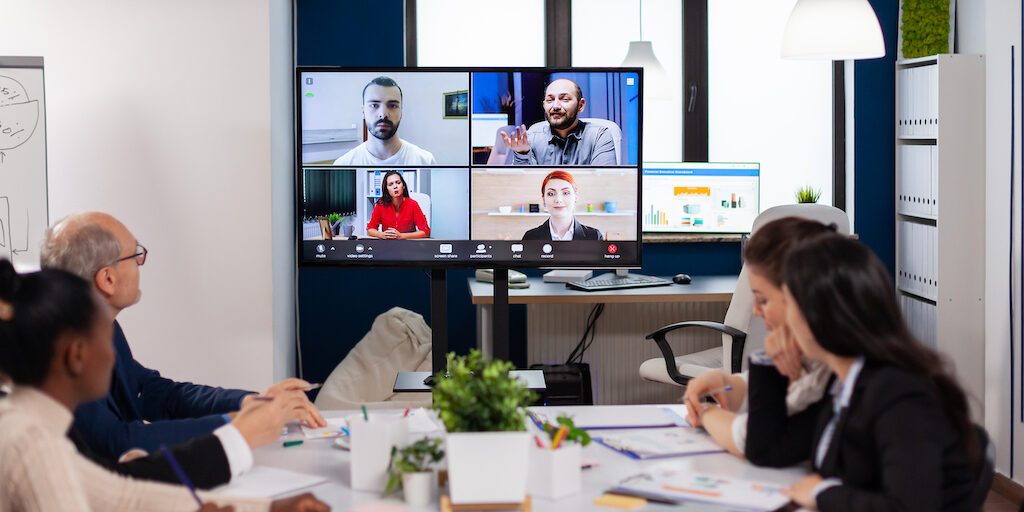 Team working by group video call share ideas brainstorming negotiating